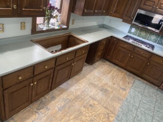 Kitchen with water damage being repaired by Rob & Teresa Schwartz Contracting